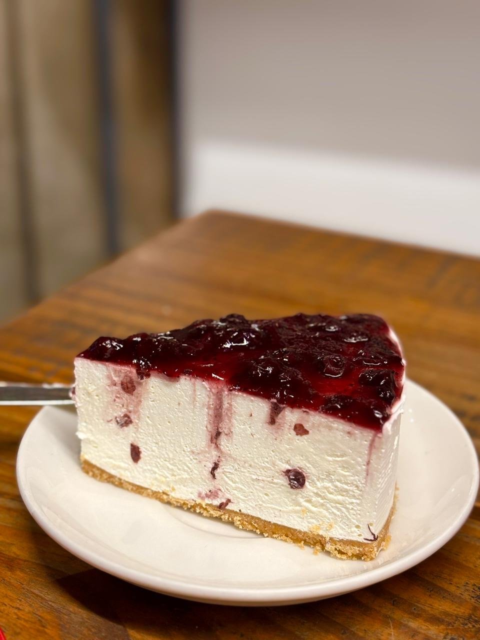 Slice of blueberry cheesecake